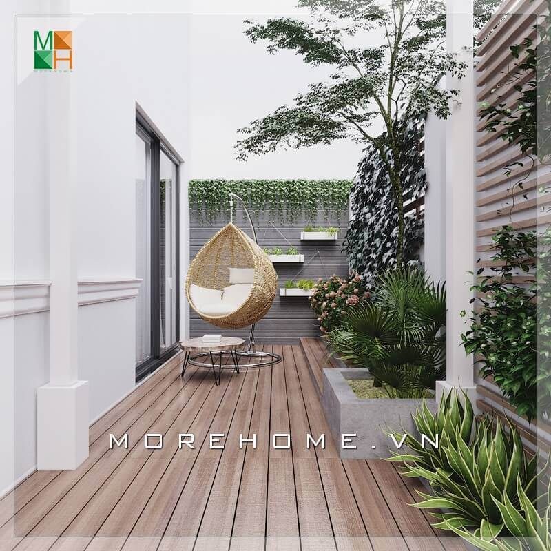 Thiết kế không gian lối đi hông nhà biệt thự đẹp và ấn tượng với hàng cây xanh mát đầy sức sống.