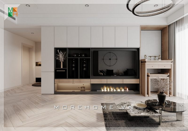 Vẻ đẹp thoáng đãng và tinh tế được toát lên nhờ sự sắp xếp thông minh, sử dụng hệ thống tủ kệ âm tường treo tivi trong thiết kế nội thất phòng khách căn hộ hiện đại.